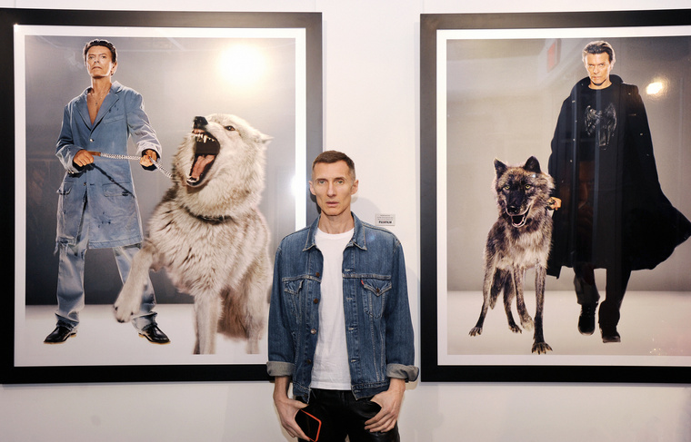 markus in front of artwork of david bowie