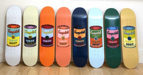 Andy Warhol Foundation with THE SKATEROOM, 8 skateboards each with a different color with Andy Warhol's Campbell Soup Can.